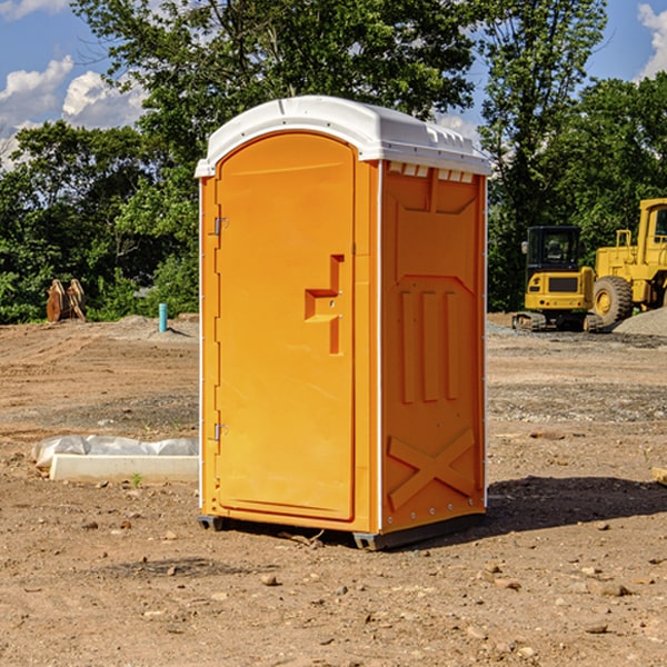 what is the cost difference between standard and deluxe portable restroom rentals in Harrisburg SD